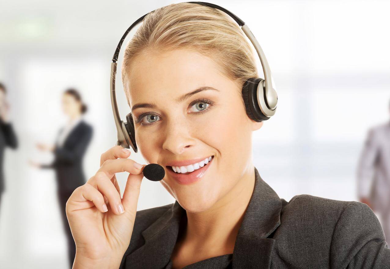 Woman with headset in call center