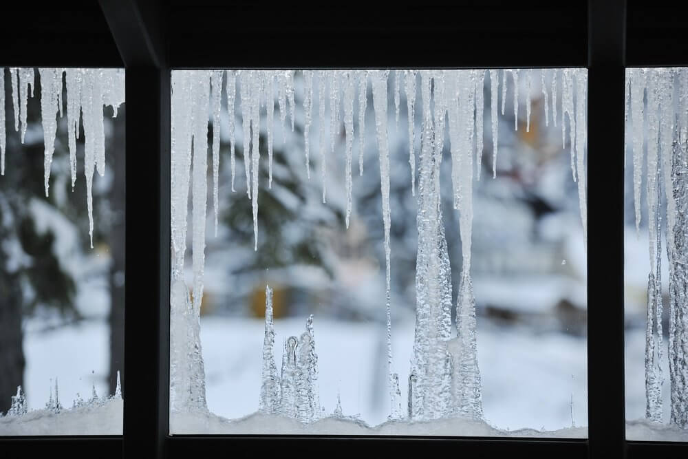 frozen window with ice background.jpeg